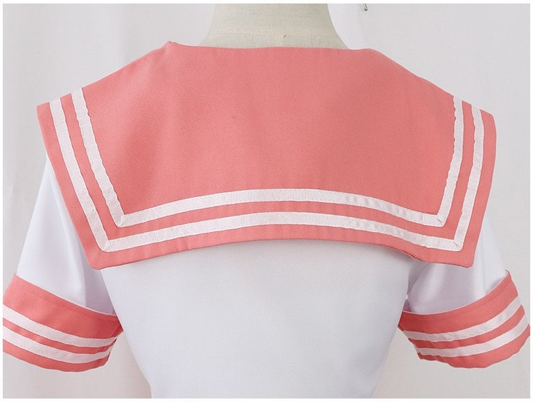 back detail shot of wide pink sailor lapel with double white stripes short sleeve cuff astolfo sailor outfit