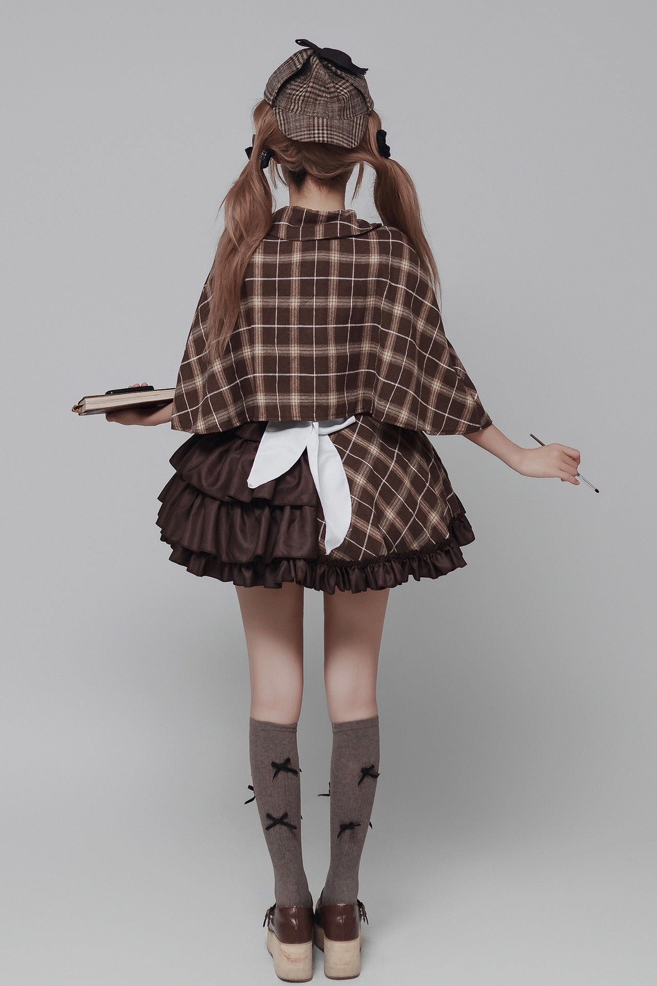 rear shot brown grid maid outfit layered ruffle skirt white back bow plaid cape detective cosplay