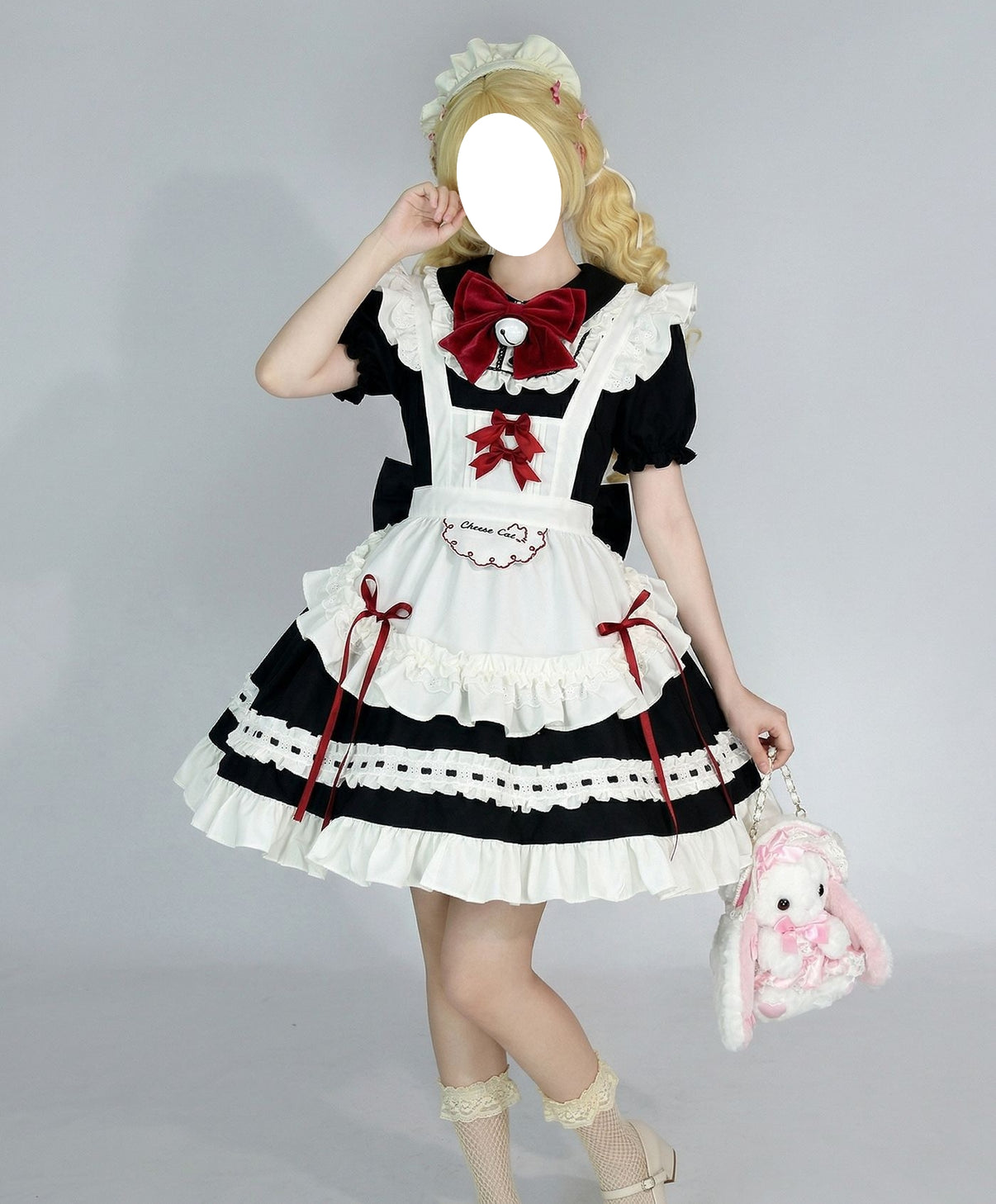 model wearing frilled maid outfit holding themed bunny plush