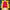 closeup of jubilee cosplay bright yellow stand collar jacket and pink crop top with x men emblem